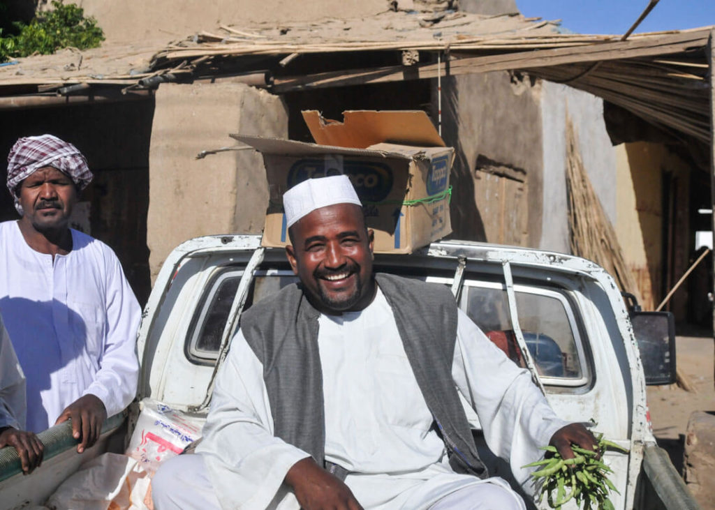 A man selling vegetables at the market of Abri