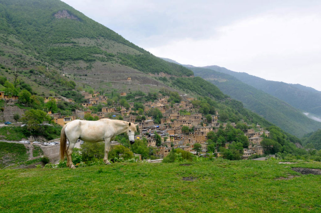 Masuleh and a horse from a top of a hill