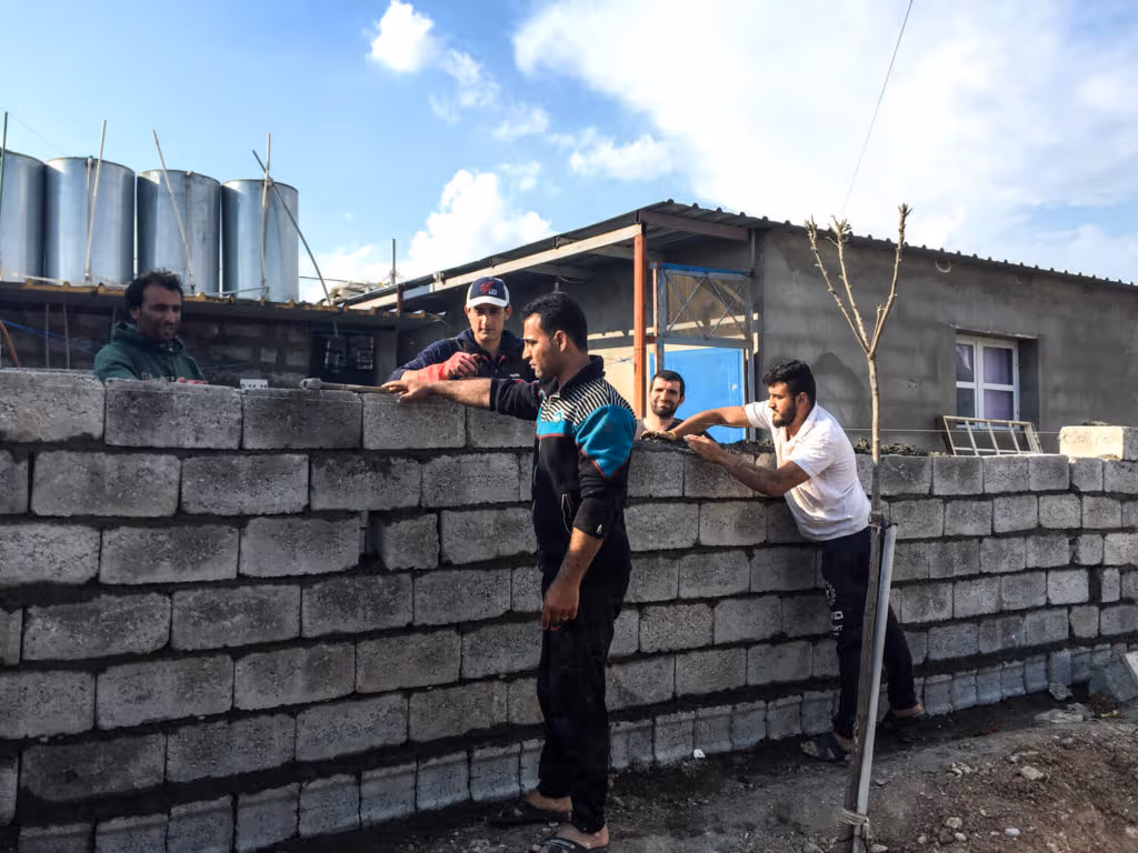 Refugees building their new houses
