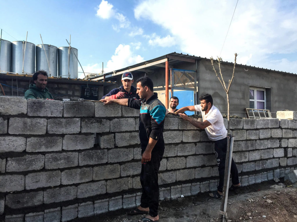 Refugees building their new houses