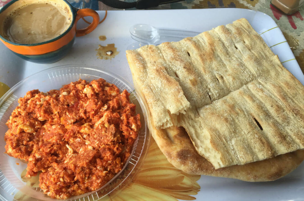 Mirza ghasemi is a traditional Iranian breakfast consisting of eggs, tomato, garlic and smashed eggplant