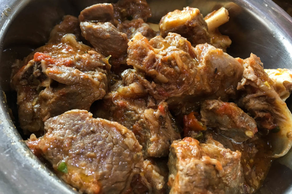 Shinwari Lab Karahi, a Pakistani dish con sisting of tender lamb slow cooked with tomatoes