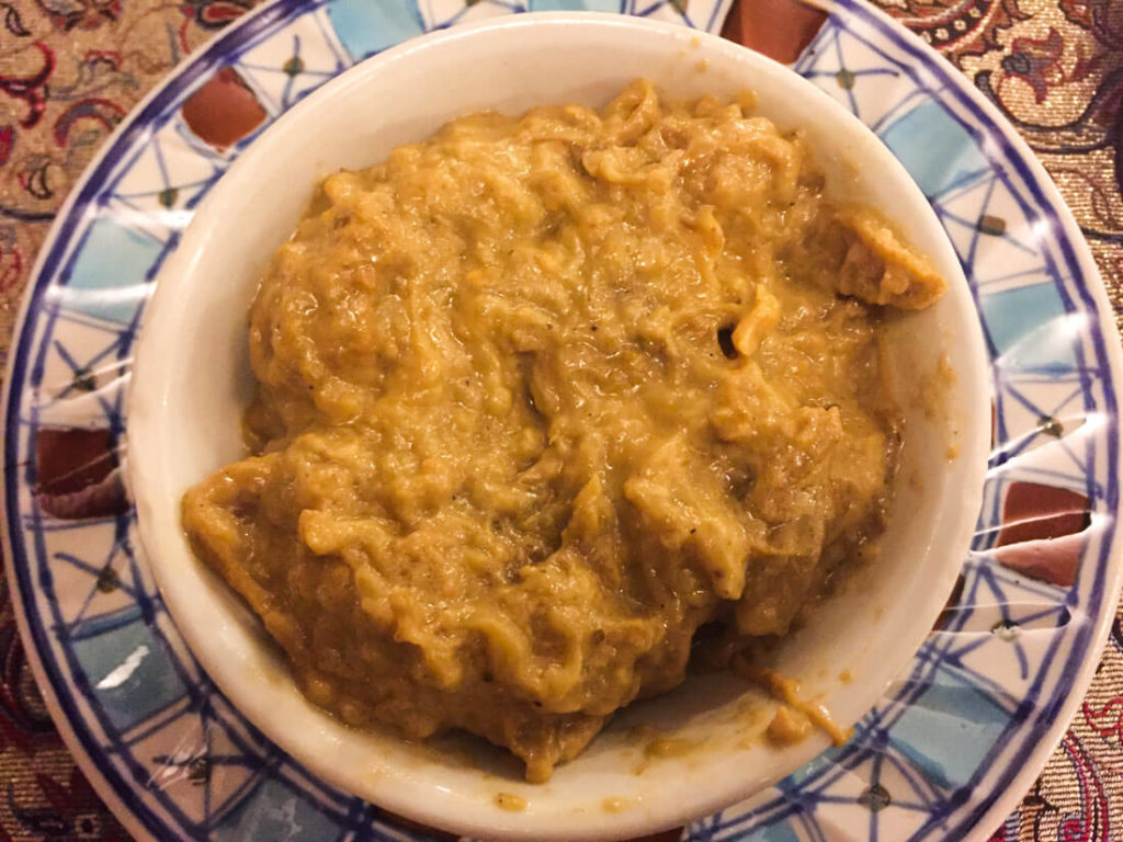 Traditional vegetarian Iranian dish consisting of smashed eggplant. It´s served hot