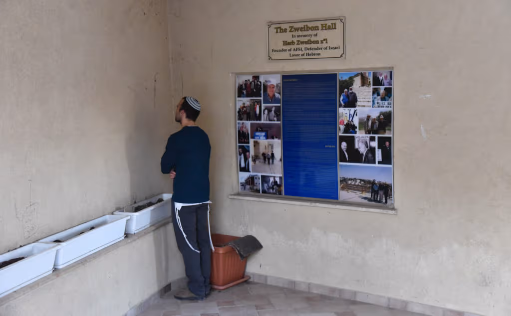 A Jewish praying in the Jewish settlement of Hebron