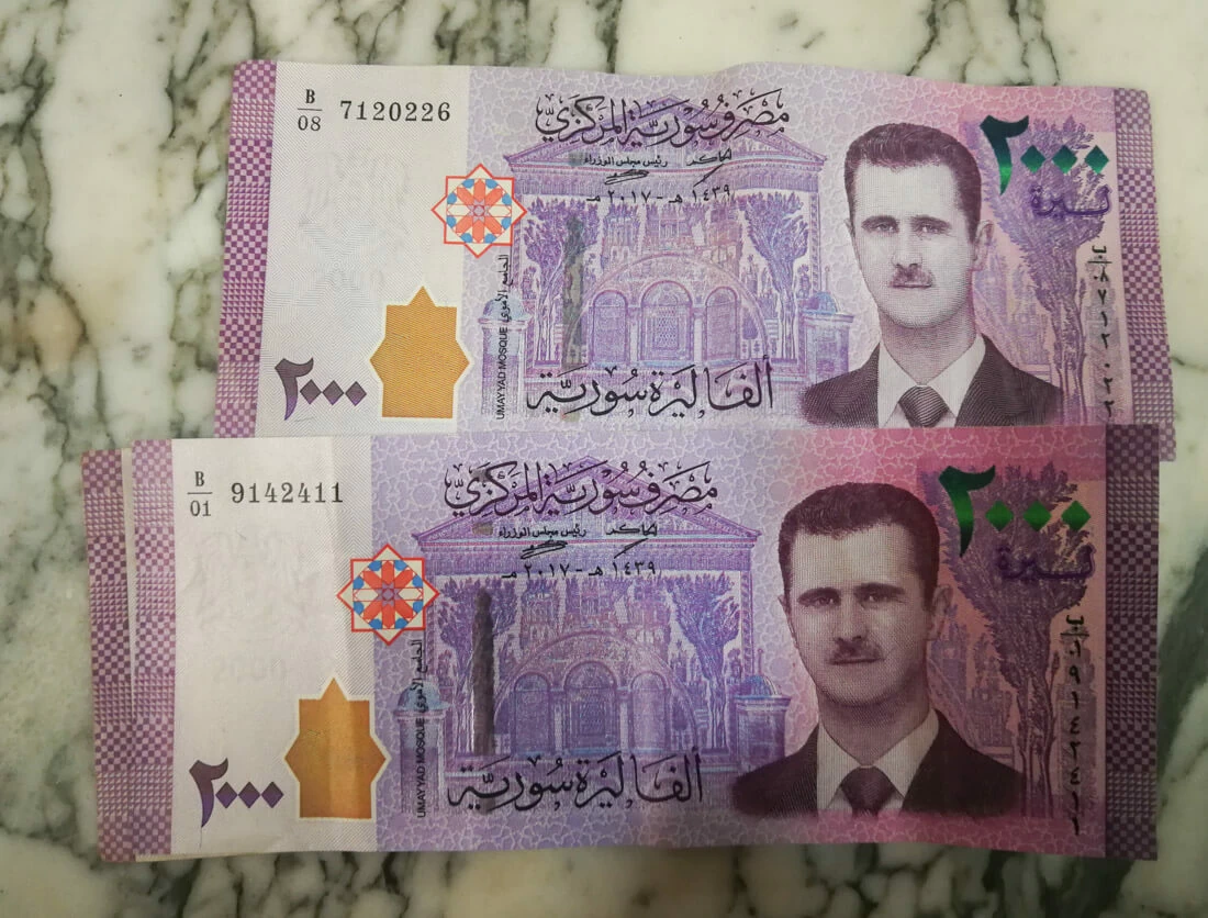 dinero en Siria